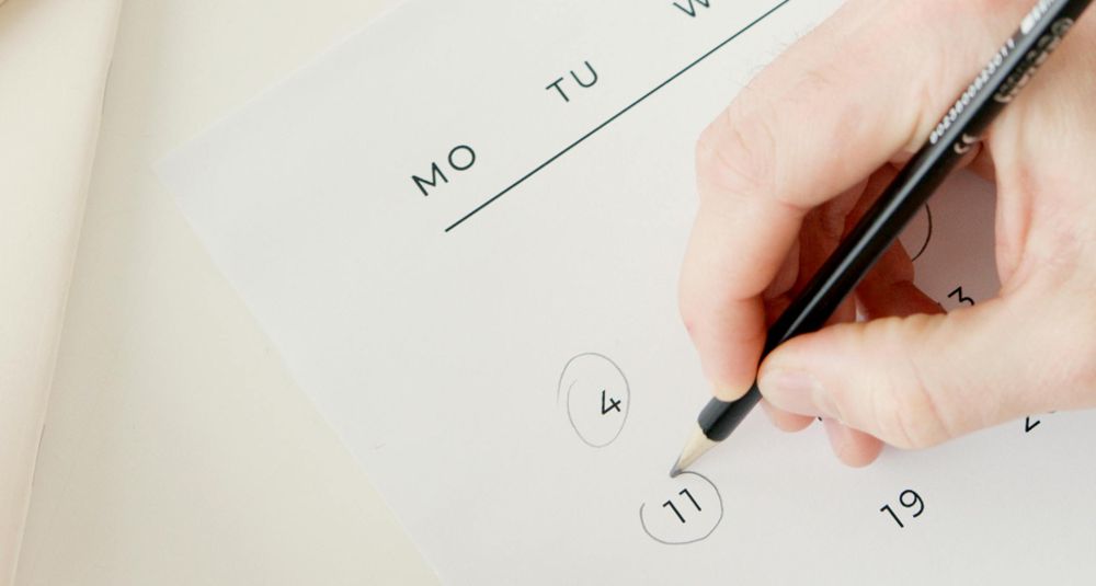 Photo by Artem Podrez: https://www.pexels.com/photo/person-marking-and-scheduling-important-dates-on-calendar-6823398/