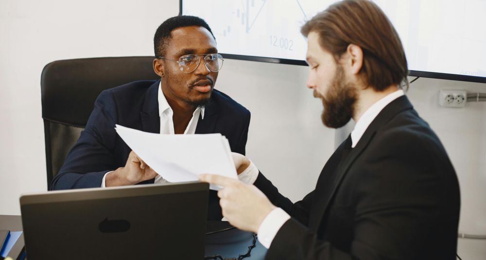 Photo by Gustavo Fring: https://www.pexels.com/photo/businessmen-with-documents-6285072/